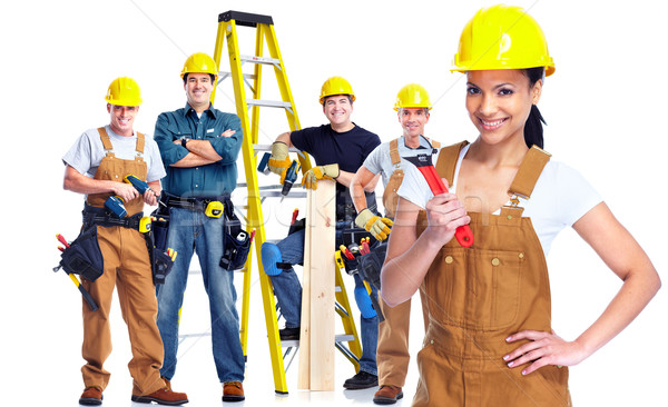 Gruppe industriellen Arbeitnehmer jungen lächelnd Arbeitnehmer Stock foto © Kurhan