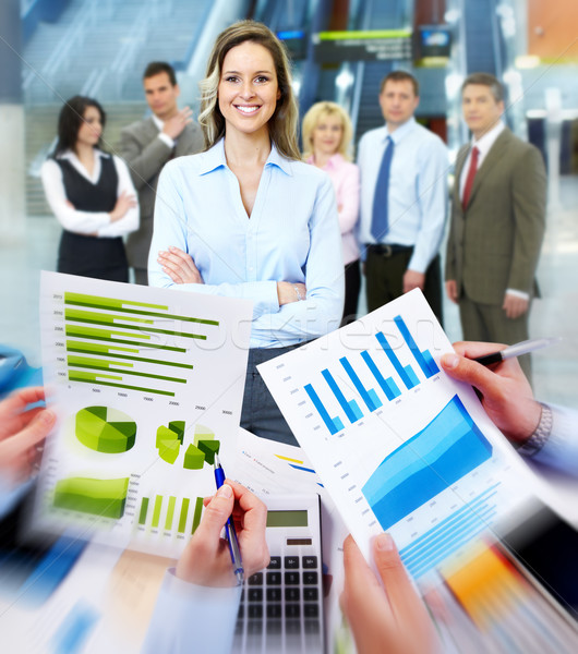 Business people working with graphs. Stock photo © Kurhan