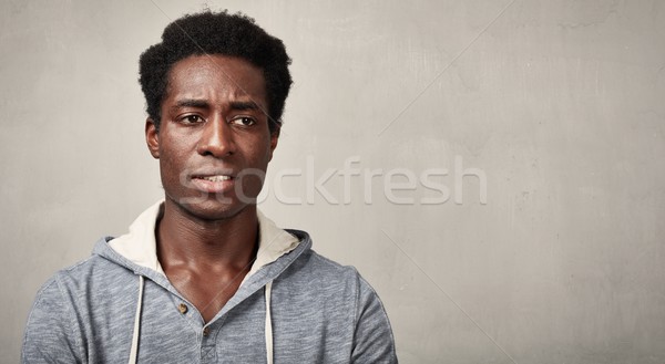 Thinking black man Stock photo © Kurhan