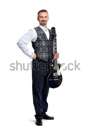 Young singer man with guitar. Stock photo © Kurhan