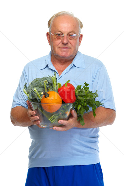 Senior man with vegetables. Stock photo © Kurhan