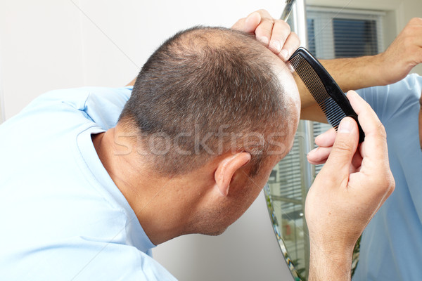 Man head with a comb. Stock photo © Kurhan