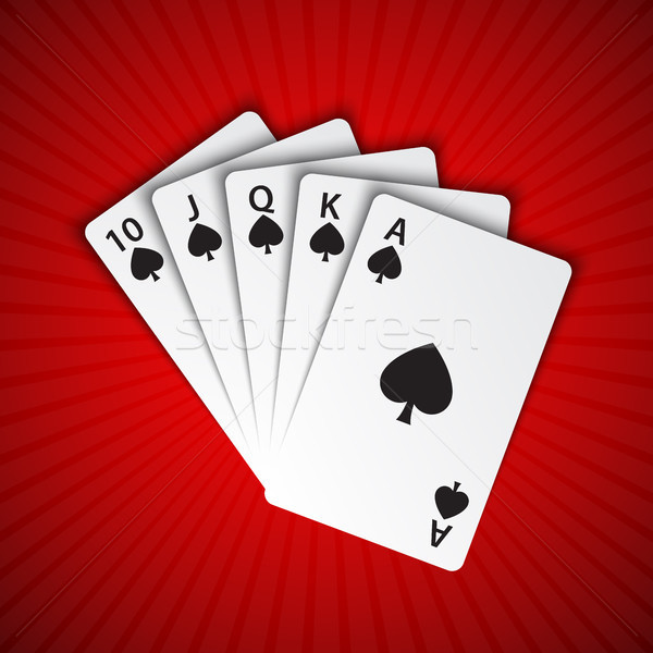 A royal flush of spades on red background, winning hands of poker cards, casino playing cards Stock photo © kurkalukas