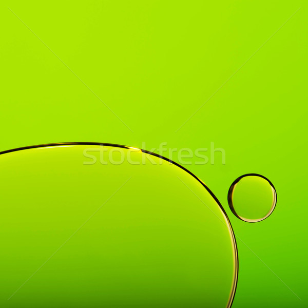 Oil drops in water, bubble on green abstract background  Stock photo © kurkalukas