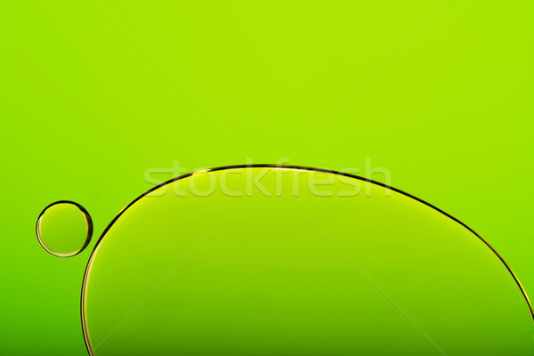 Oil drops in water, bubbles on green abstract background  Stock photo © kurkalukas