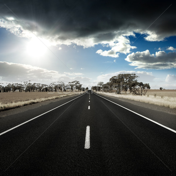 Viaggio dritto strada rurale Australia nubi Foto d'archivio © kwest