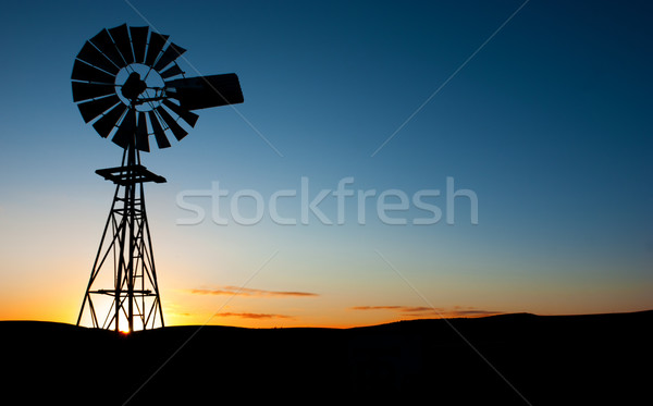 Windmolen zonsopgang zon achter landschap schoonheid Stockfoto © kwest