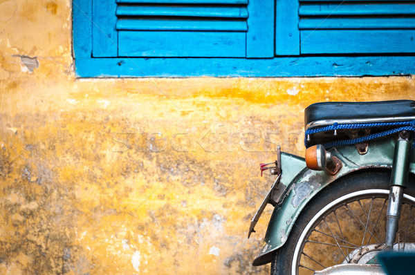 Scooter parked at old building in Vietnam, Asia. Stock photo © kyolshin
