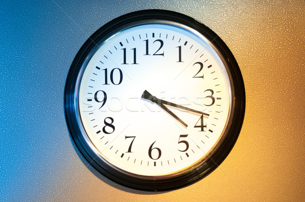 Black-and-white clock with light and shade. Stock photo © kyolshin