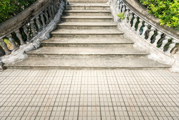 Old grungy stone stairway outdoor in summer. Stock photo © kyolshin