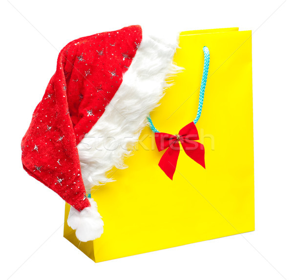 yellow packet with santa hat Stock photo © kyolshin