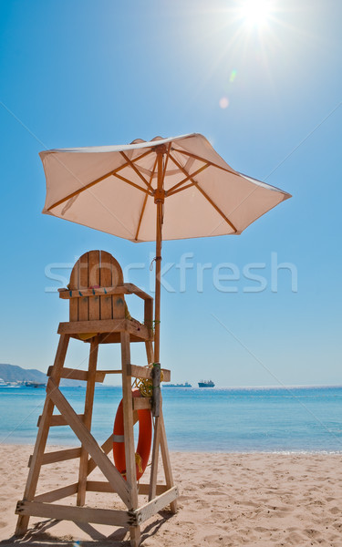 Strand veiligheid stoel zand zee lijn Stockfoto © kyolshin