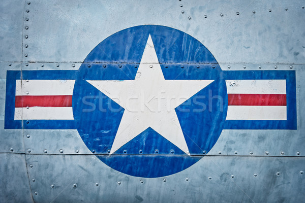 Military plane with star and stripe sign. Stock photo © kyolshin