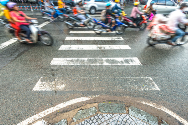 People riding scooters. Traffic in Vietnam. Stock photo © kyolshin