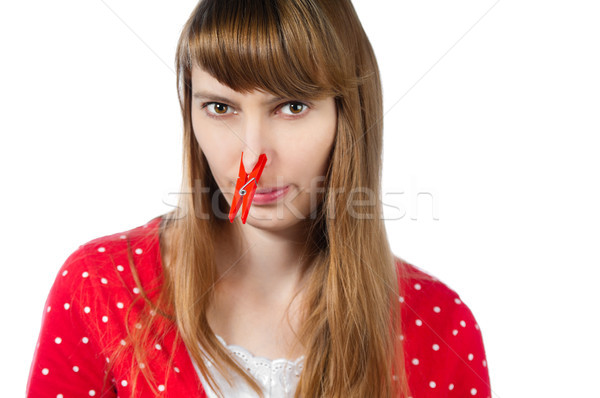 Dziewczyna clothespin nosa piękna młoda kobieta czerwony Zdjęcia stock © kyolshin