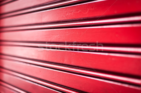 Abstract background of red metal stripes. Stock photo © kyolshin