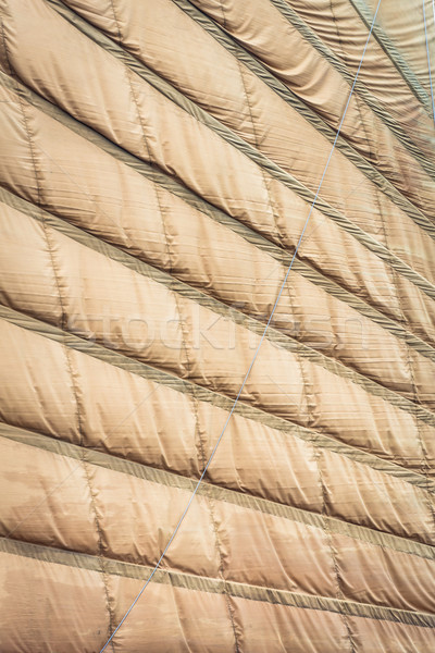 Light brown sail of vietnamese boat close up. Stock photo © kyolshin