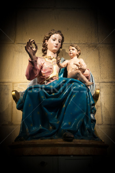 Statue of Virgin Mary with Jesus in church. Stock photo © kyolshin