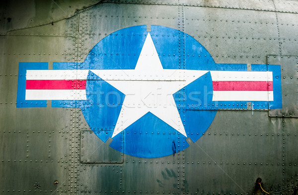 Military plane with star and stripe sign. Stock photo © kyolshin