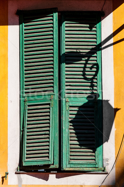 Old window in Nice city, France. Stock photo © kyolshin