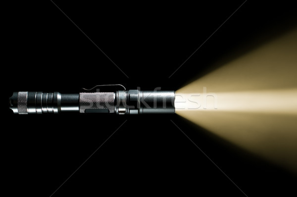 Stock photo: flashlight with beam of light