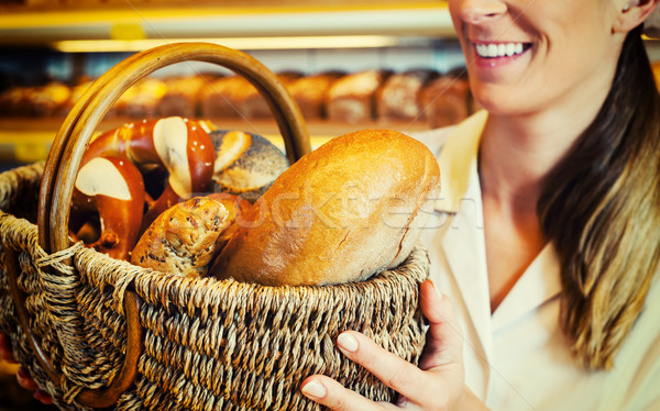 Pék nő elad kenyeres kosár bolt vásár Stock fotó © Kzenon