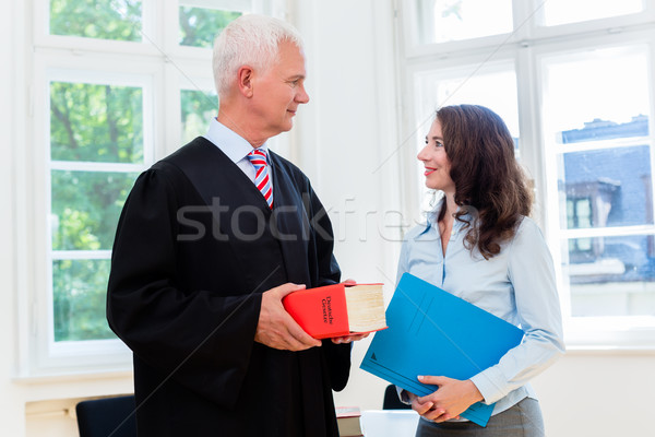 Lawyer and paralegal in their law office Stock photo © Kzenon
