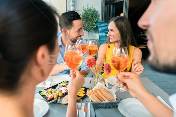 Deux heureux jeunes couples séance [[stock_photo]] © Kzenon