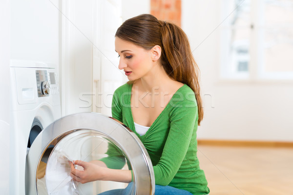 Stock photo: Housekeeper with washing machine