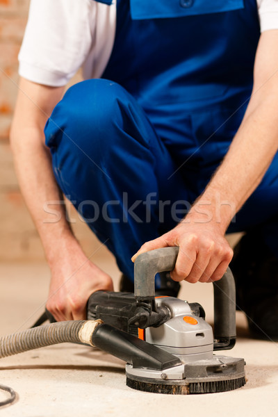 Sanding The Cement Floor Stock Photo C Arne Trautmann Kzenon