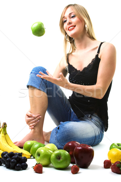 Girl throwing apple Stock photo © Kzenon