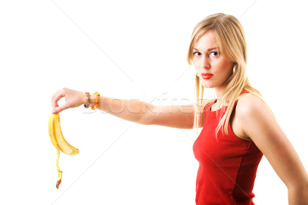 girl drops banana peel Stock photo © Kzenon