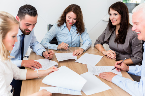 Lawyers having team meeting in law firm Stock photo © Kzenon