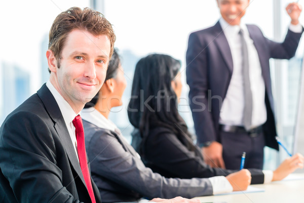 Asian Businesspeople in office team meeting Stock photo © Kzenon