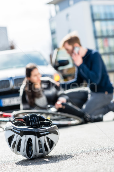 Close-up of a bicycling helmet fallen down on the ground after an accident Stock photo © Kzenon
