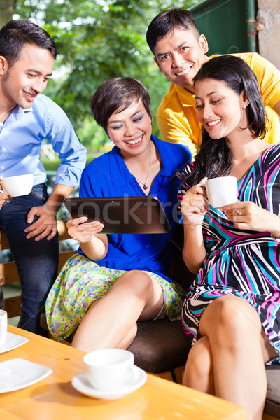 Group of young people in an Asian coffee shop Stock photo © Kzenon