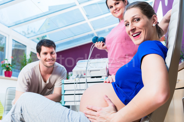 Pregnant woman having CTG in gynecological clinic Stock photo © Kzenon