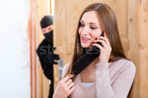 Burglary crime - culprit and victim Stock photo © Kzenon