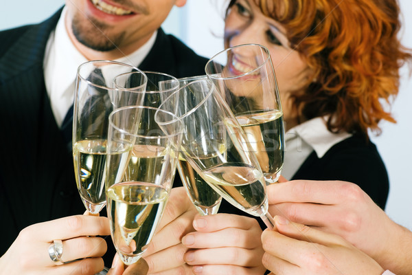 Clinking champagne glasses Stock photo © Kzenon