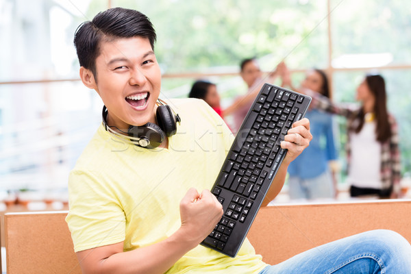 Jonge chinese werknemer gelukkig geslaagd werk Stockfoto © Kzenon