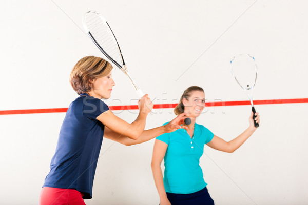 Squash racket sport in gym, women competition Stock photo © Kzenon