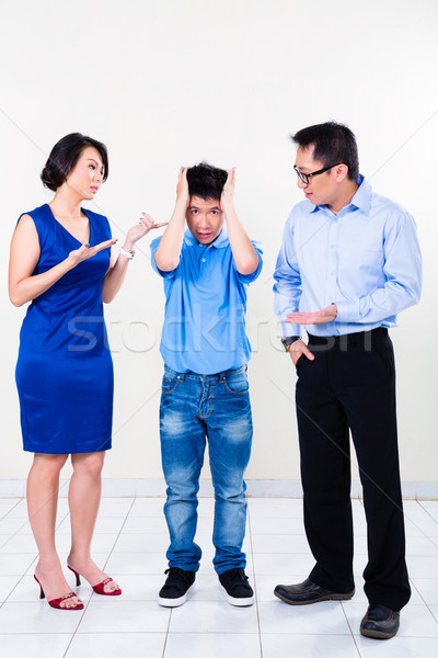 Young Chinese boy suffering from parents divorce Stock photo © Kzenon