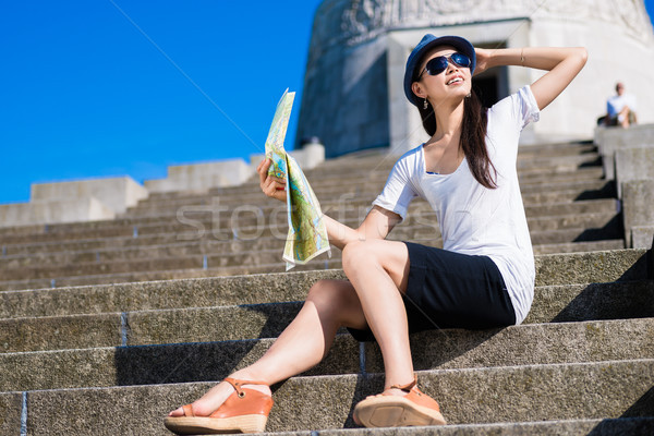 Asian female tourist smiling  outdoors Stock photo © Kzenon