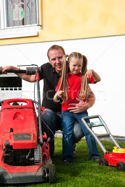 Père fille pelouse ensemble famille travaux [[stock_photo]] © Kzenon