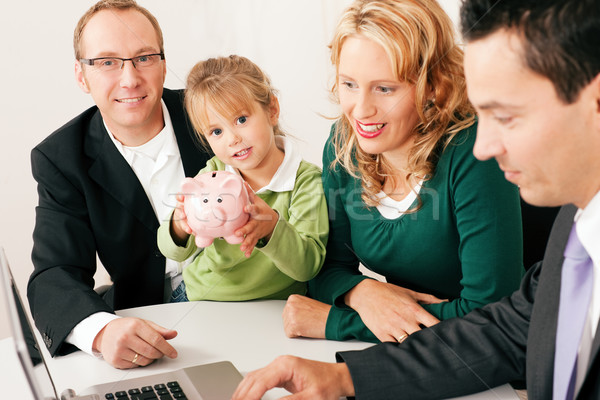 Family with consultant - finance and insurance Stock photo © Kzenon
