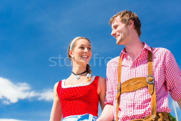 Couple visiting Bavarian fair having fun Stock photo © Kzenon