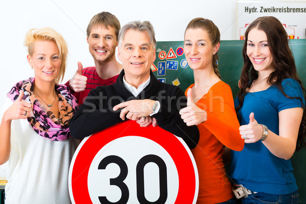 Driving instructor with his class Stock photo © Kzenon