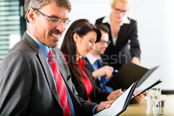 Business - businesspeople have team meeting Stock photo © Kzenon