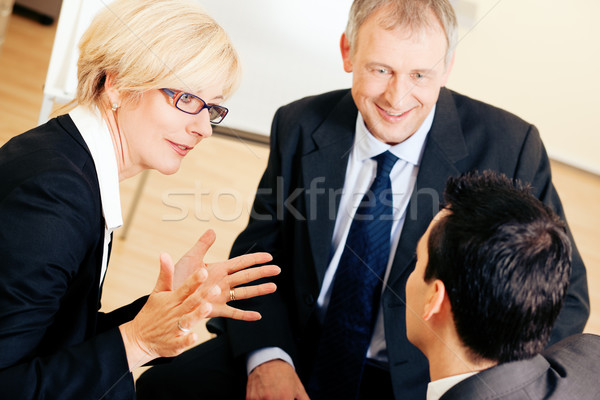 Business team discussing a project Stock photo © Kzenon