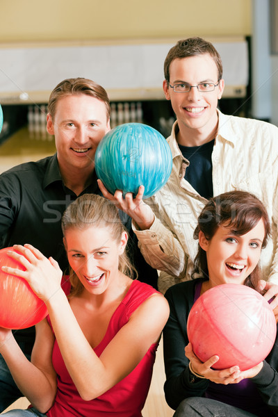 Friends bowling together Stock photo © Kzenon